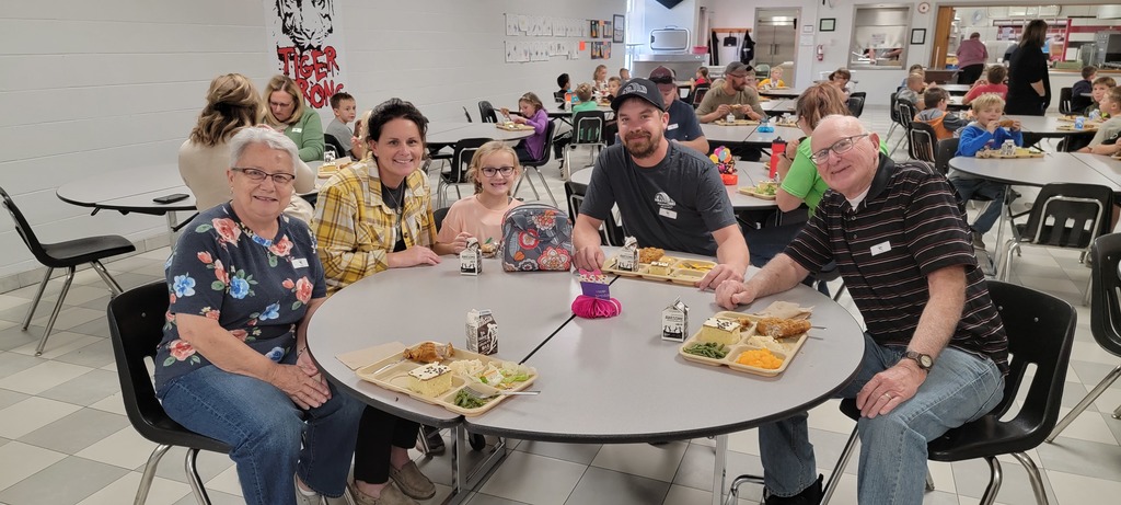 student celebrating birthday lunch with family and friends